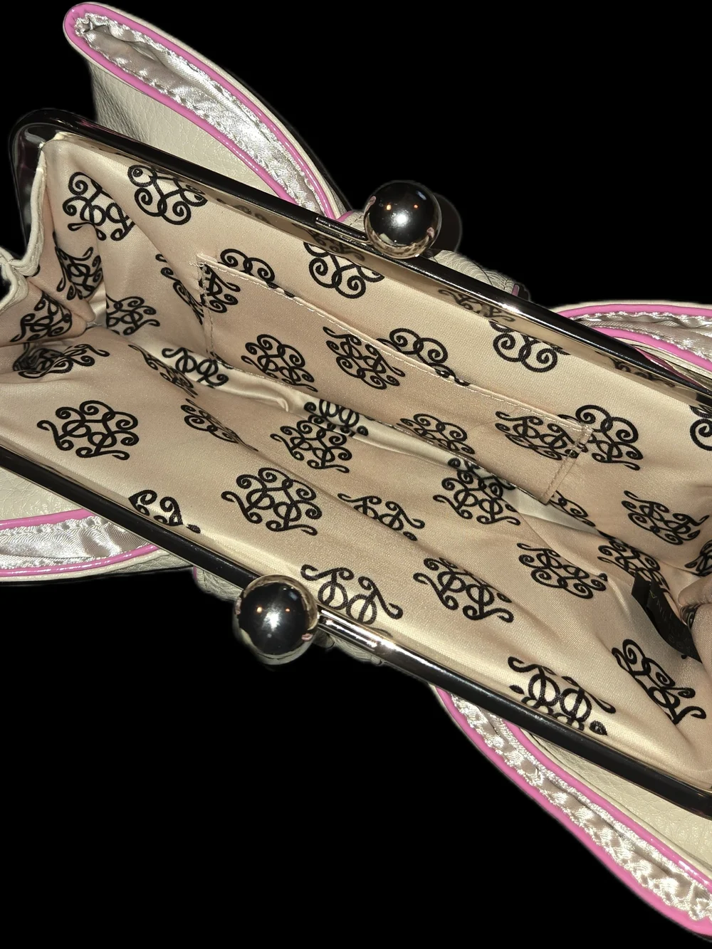 Elegant Cream Kiss-Lock Clutch with Pink Trim By Jessica Simpson. Flawless.